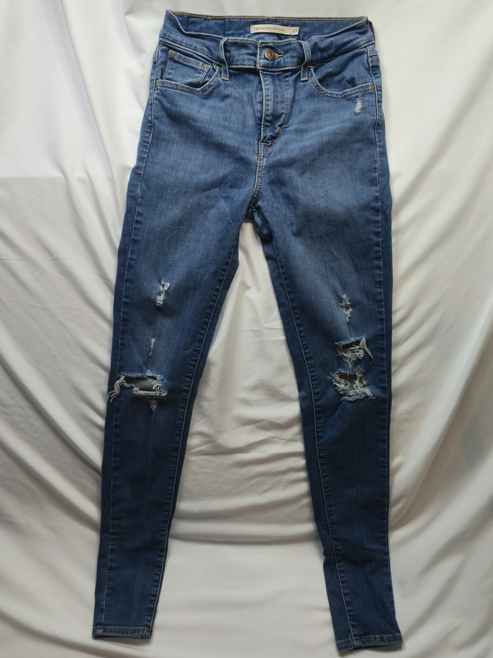 Levi's 720 High Rise Super Skinny Women's Distressed Jeans in Medium Blue